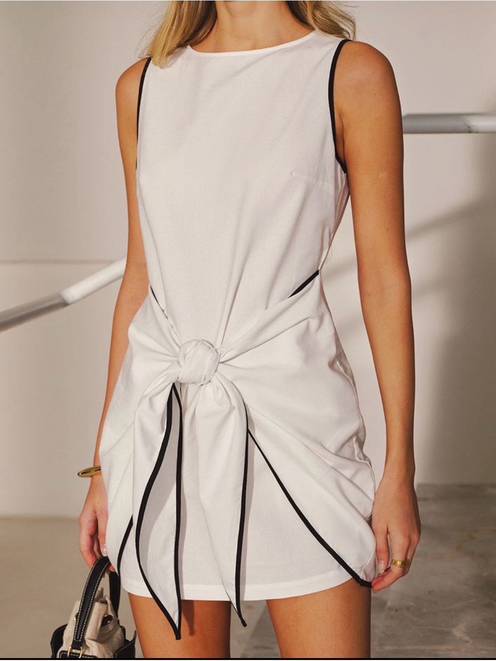 Commense Sleeveless White Tie-Front Mini Dress with Black Trim